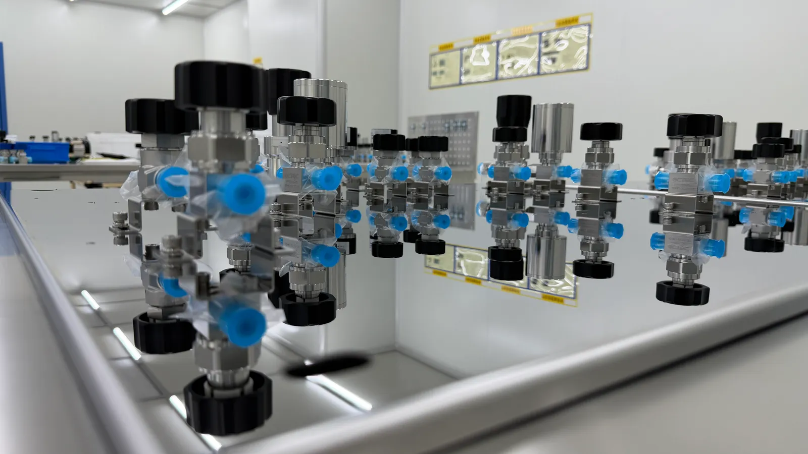 Precision gas-control components on an assembly bench