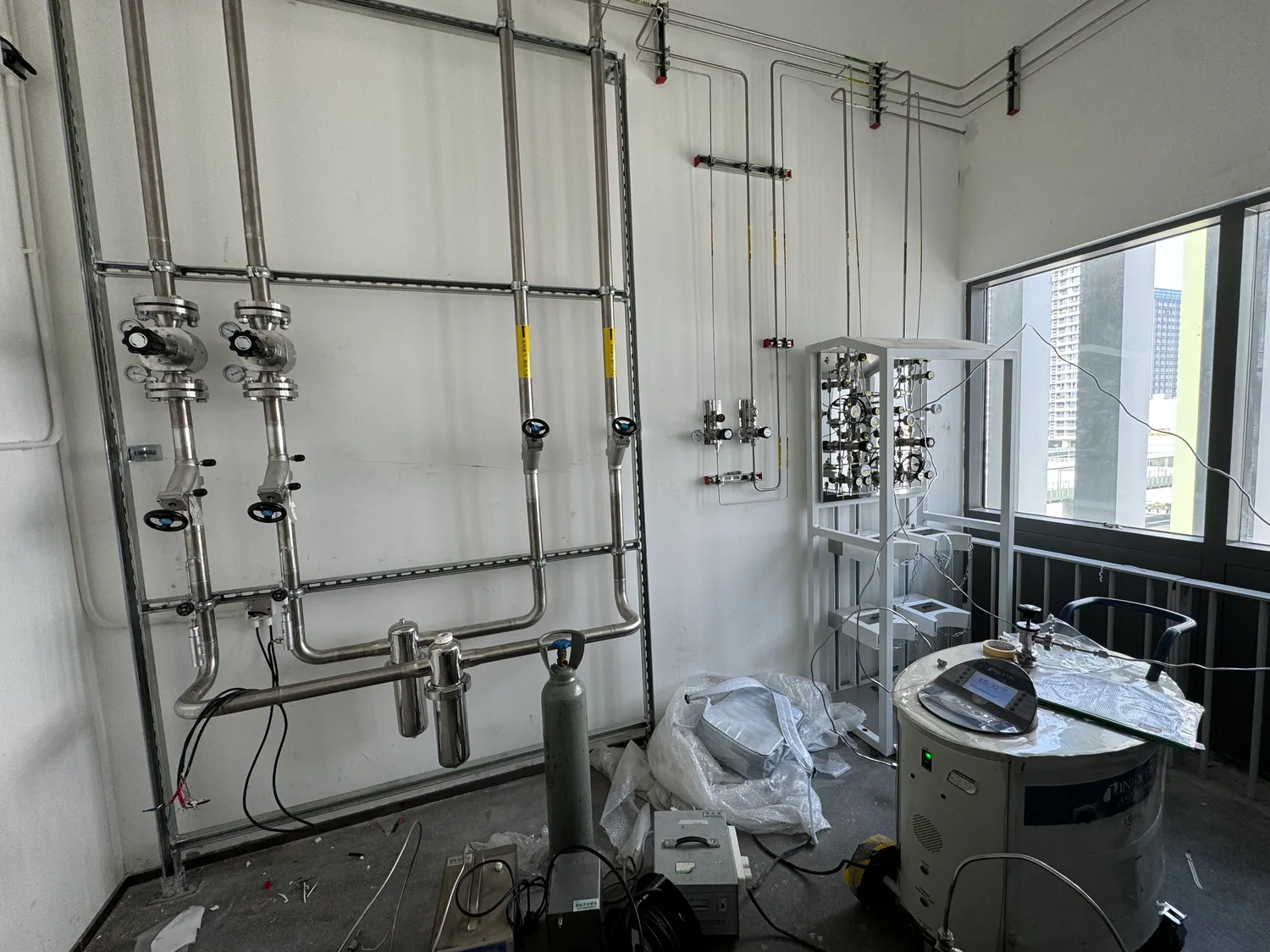 Stainless-steel gas lines routed to a local control panel