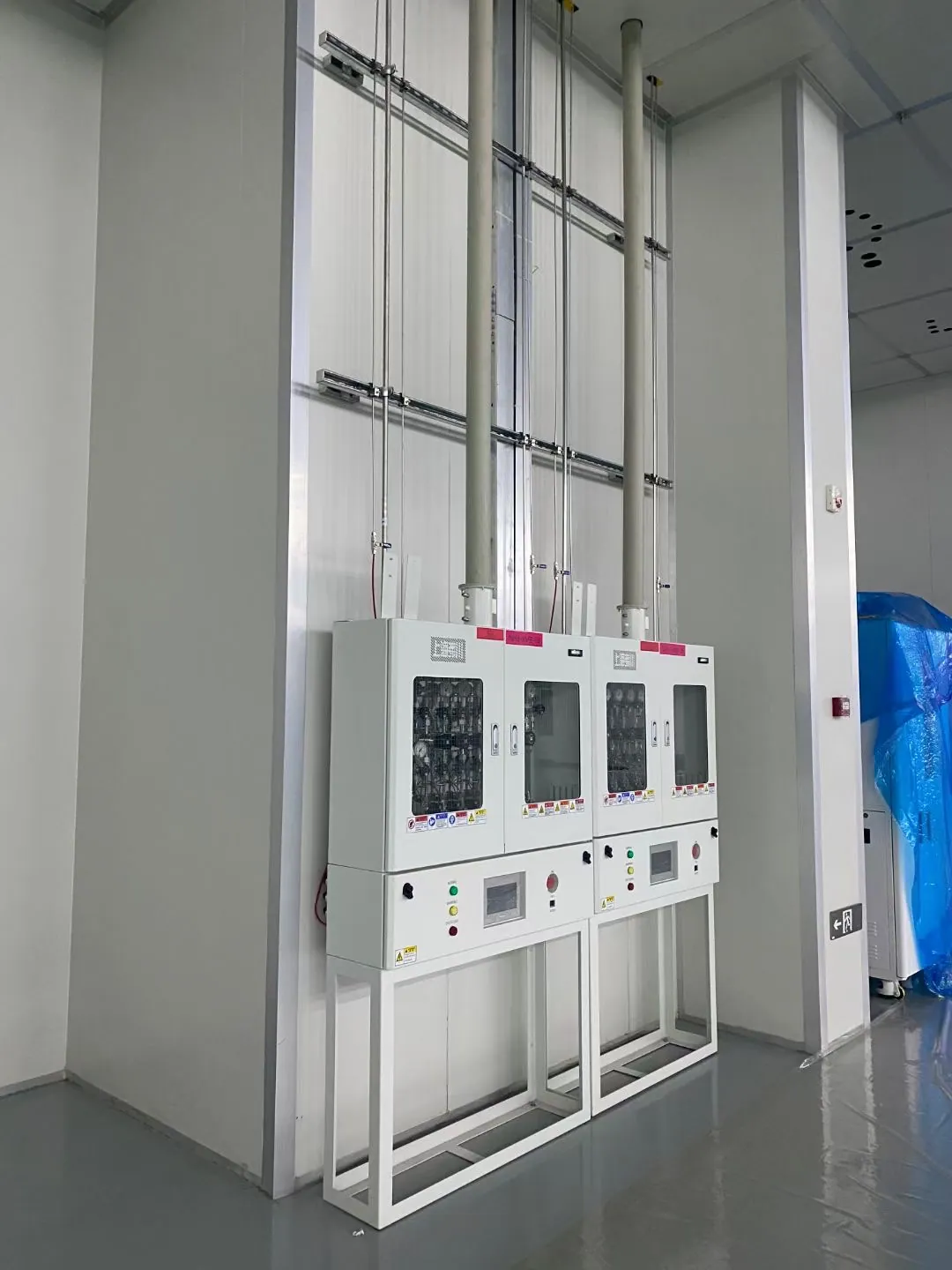 Wall-mounted gas control panels in a research facility
